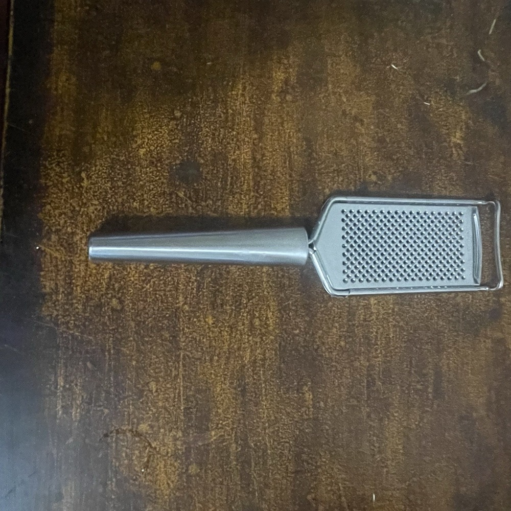 Oneida Stainless Steel Hand Grater/ Zester with Hand Grip and Pot Hook.
